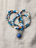 MALA | AERISYA : Collier rituel en Aigue-marine/Apatite et Sodalite