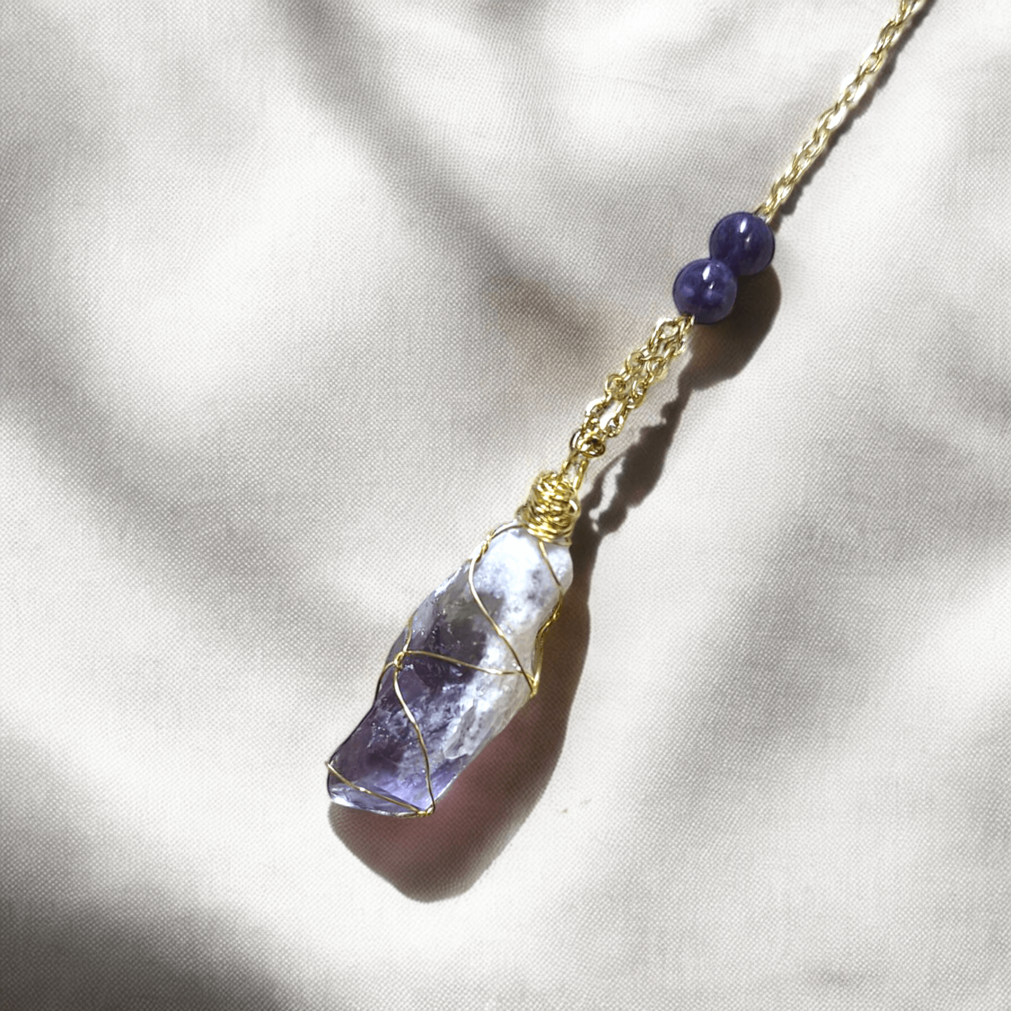 Lythaë - Pendule en améthyste (Plusieurs modèles) - L'Atelier de Tabatha